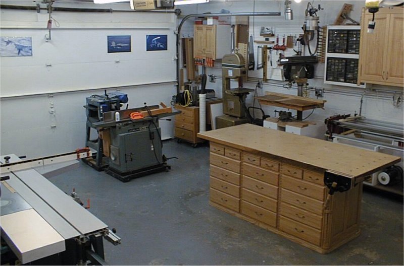 Phil converted a two-stall garage into his shop . His tour includes a 